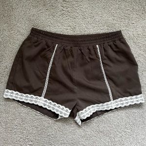 Umgee short with lace trim. Size S.